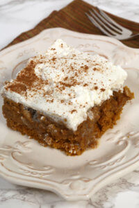 This is one of the best Pumpkin Poke Cake recipes you will ever try!  It's light, flavorful and oh, so moist.
