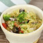 A small bowl filled with the side dish.