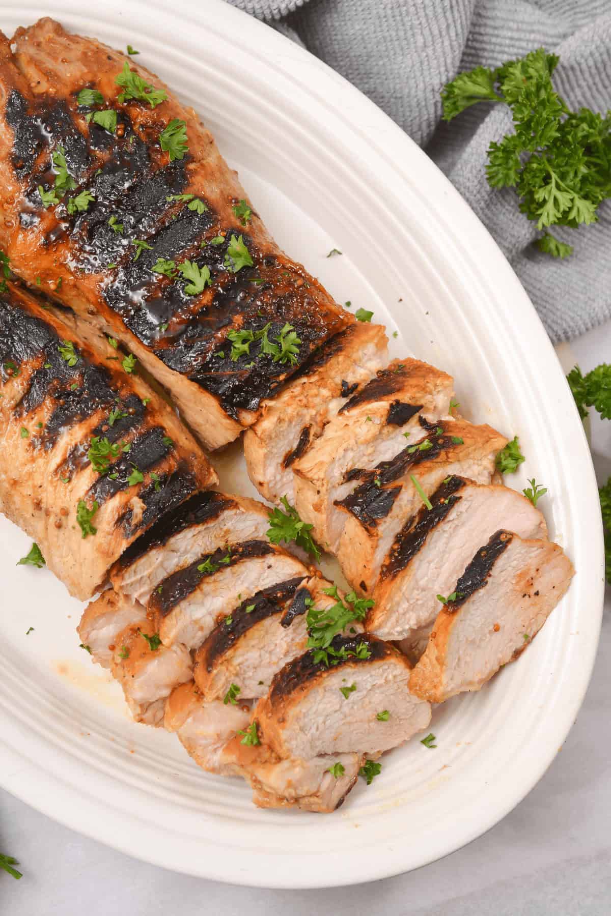 A top view of the grilled marinated pork loin.