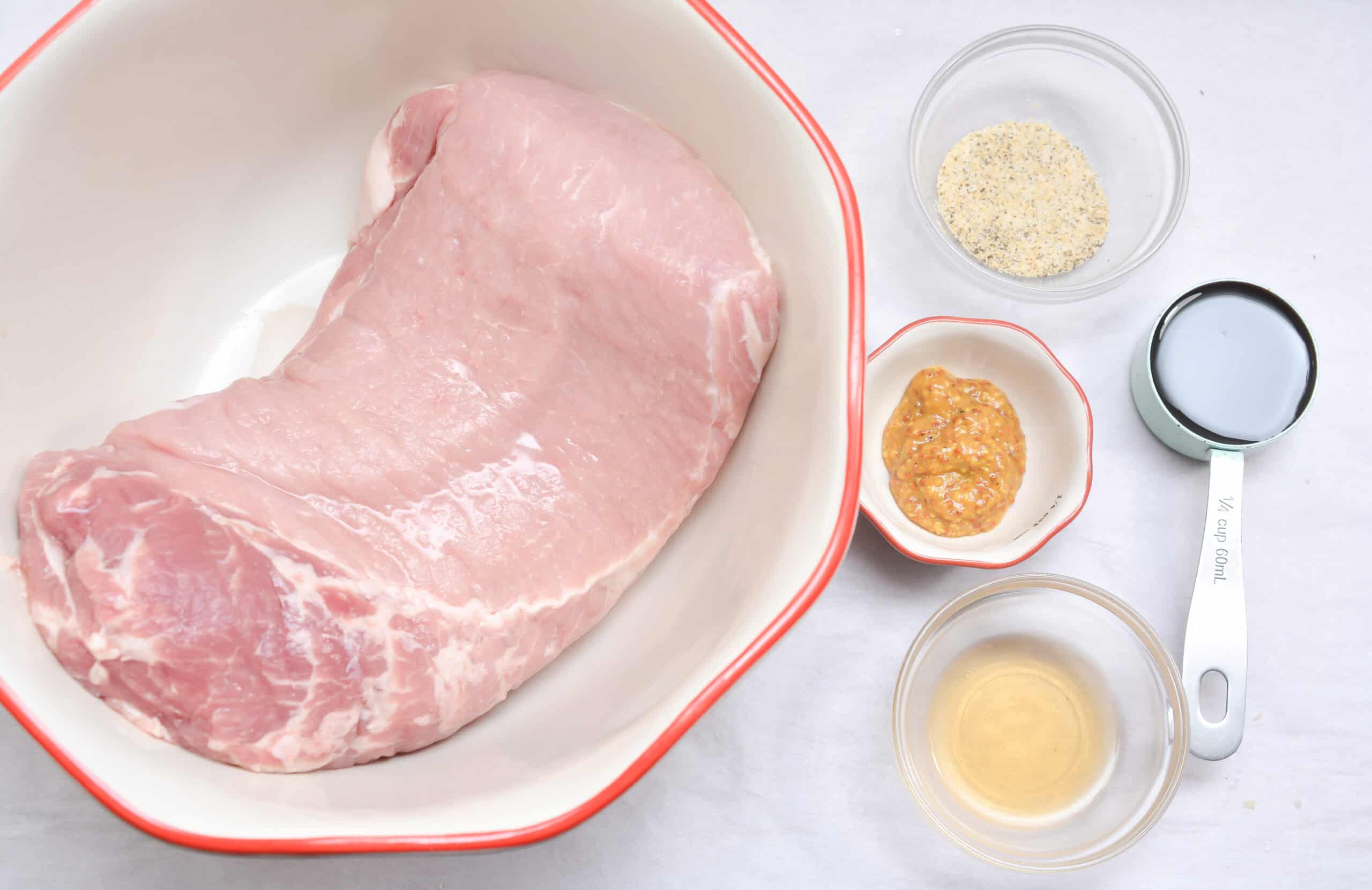 Th meat along with the ingredients to make the sauce.