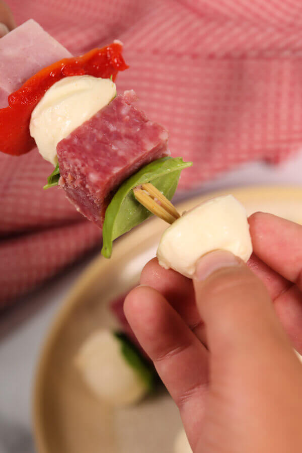 Italian Lunchbox Kabobs with pink napkin.