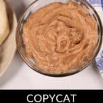 A clear bowl filled with a fluffy, cinnamon butter mixture. Text overlay reads: "Copycat Texas Roadhouse Butter".