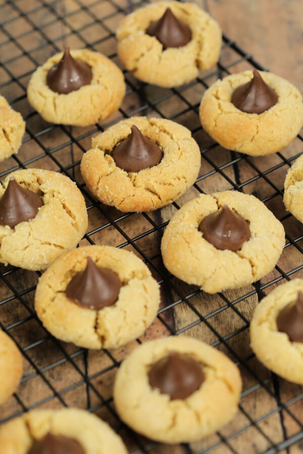 Peanut Butter Kiss Cookies on a wire baking rack