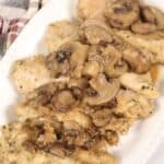 A delicious and creamy dinner on a white platter.