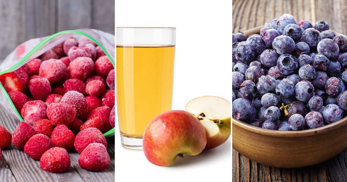 A bag of frozen strawberries, a glass of apple juice with two apples, and a wooden bowl of frozen blueberries are shown side by side—perfect ingredients for a refreshing Mixed Berry Smoothie.