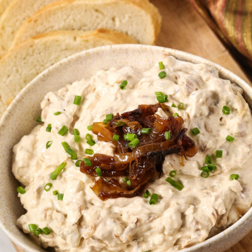 A bowl of caramelized Onion dip topped with more onions.