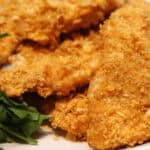 A plat of the meat with parsley on the side.