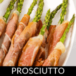 A plate of prosciutto wrapped asparagus spears, arranged neatly for serving.