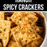 A white bowl filled with seasoned rectangular crackers is labeled "Crispy Ranch Spicy Crackers.