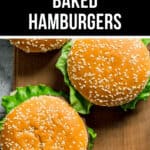 Three sesame seed-topped baked hamburgers with lettuce on a wooden surface. Text above reads, "Best Baked Hamburgers.