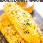 corn with cheese on a plate
