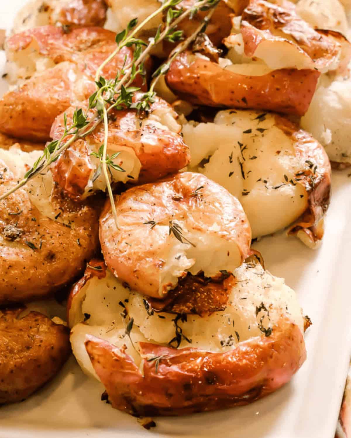 A platter of the side dish garnished with fresh thyme.