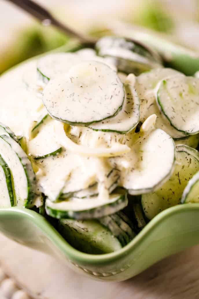 close up on cucumber onion salad with dill
