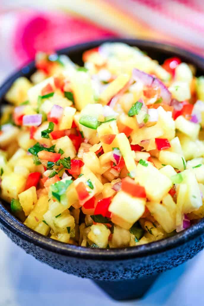 pineapple salsa in blue marble bowl