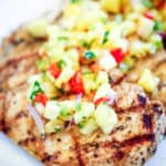 Grilled Chicken with Pineapple Salsa on white plate