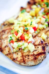 Grilled Chicken with Pineapple Salsa on white plate