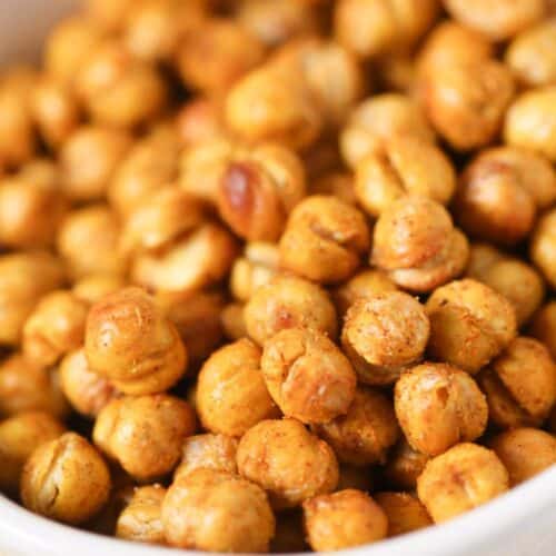 A closeup on the air fryer chickpeas in a white dish.