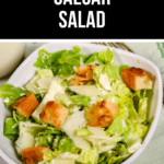 A bowl of Caesar salad topped with croutons and shaved cheese, labeled as the "Best Caesar Salad".