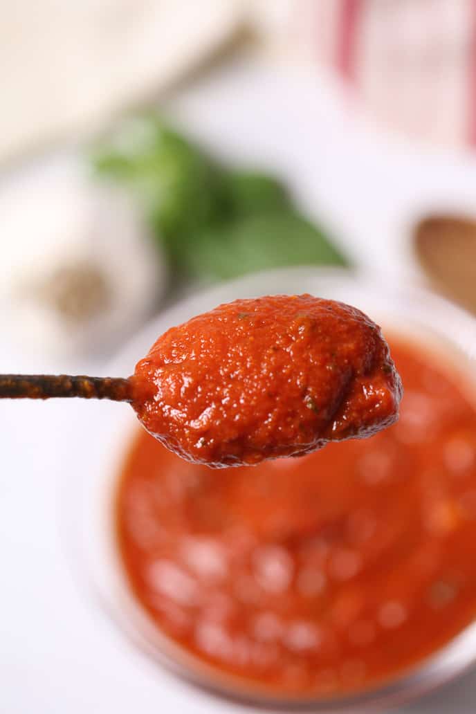 Spoonful of homemade pizza sauce