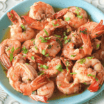 A plate of the dish, garnished with herbs.