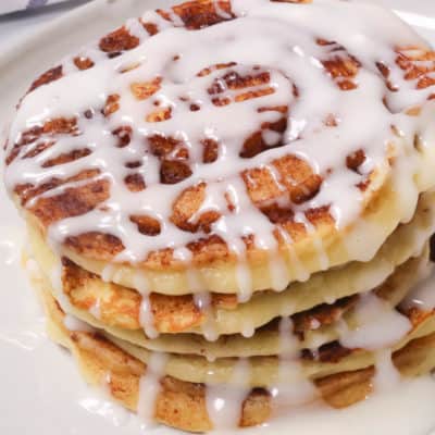 Cinnamon swirl pancakes on a white plate