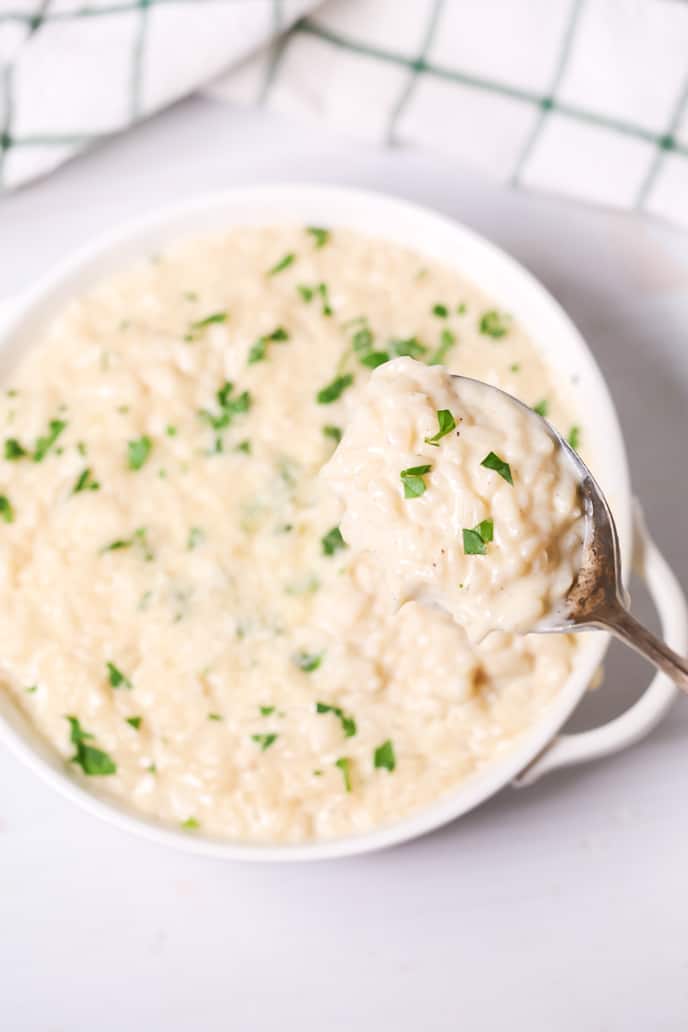 Spoon in dish of Instant Pot Risotto