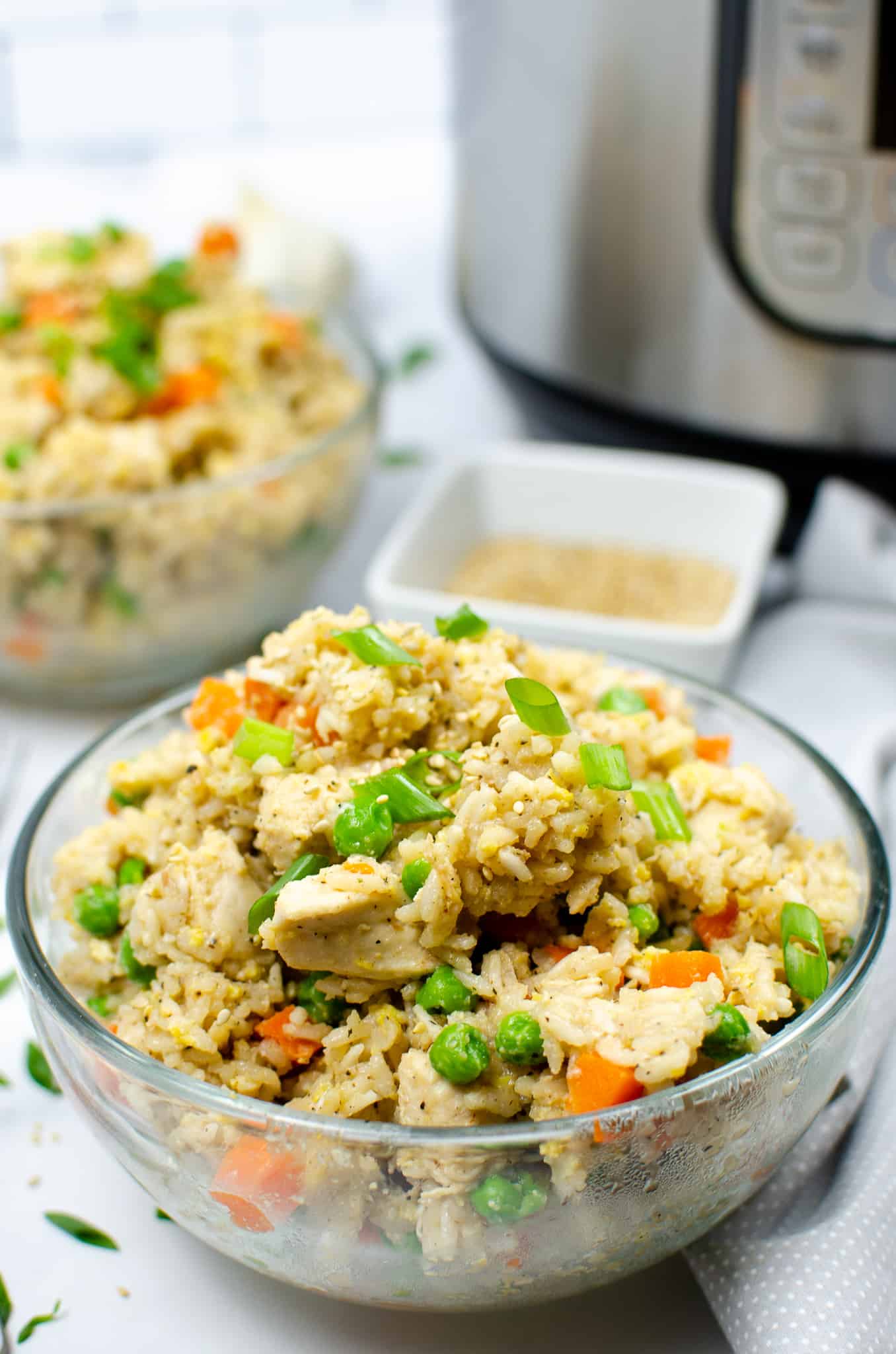 Close up of Instant Pot Chicken Fried Rice with an Instant Pot in the background