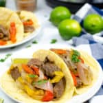 Instant Pot Steak Fajitas with limes and instant pot in background