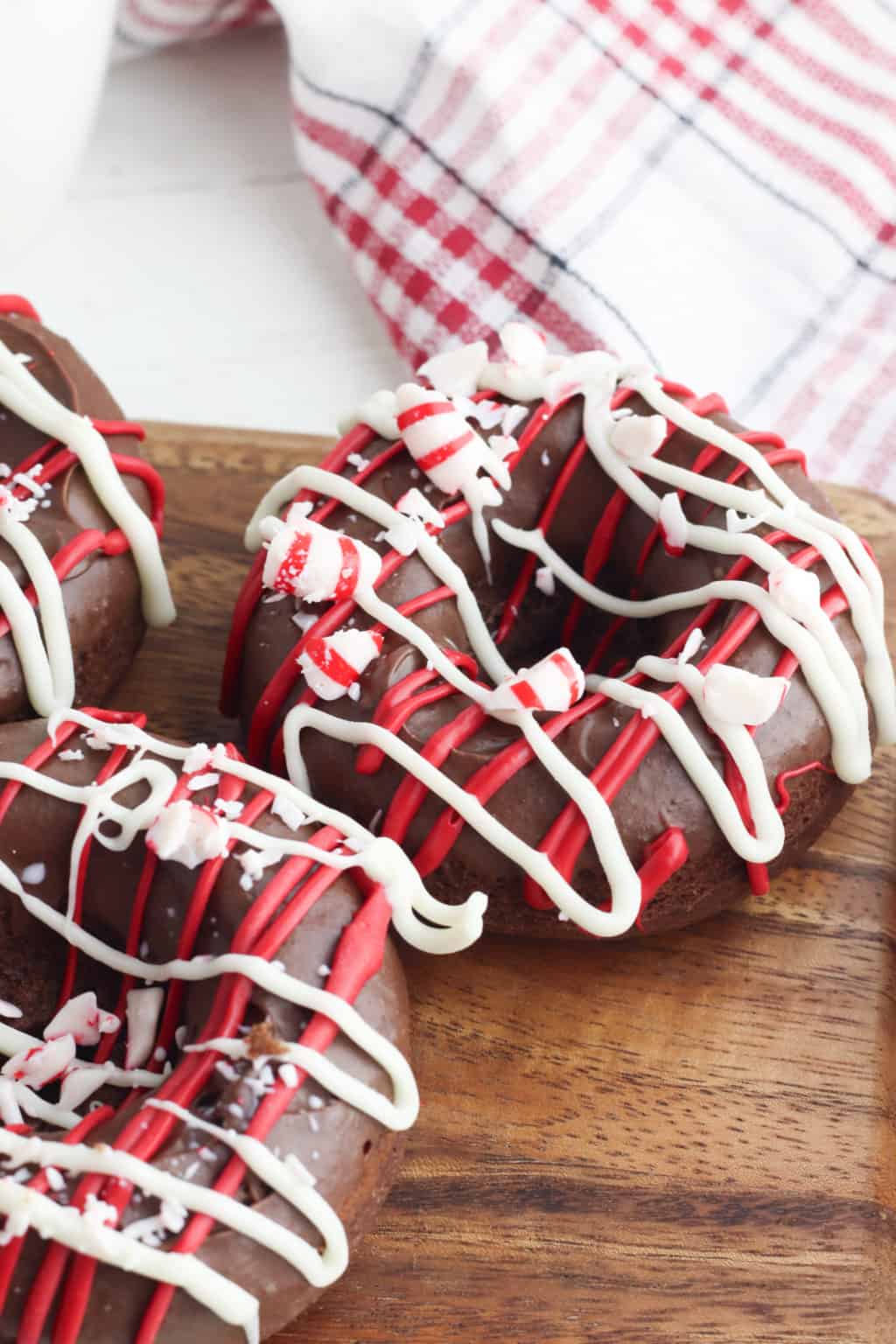 peppermint mocha donut on wooden cutting board