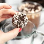 Close up of Oreo Hot Chocolate Bomb with clear glass