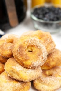 A plate full of air fryer donuts