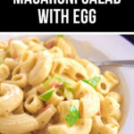 A bowl of classic macaroni salad with egg, garnished with green herbs, advertised by Hellmann's.
