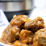 Plate of Instant Pot Hawaiian Meatballs with an Instant Pot in the background