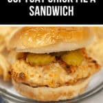 Image of a copycat Chick-fil-A sandwich made in an air fryer. The sandwich consists of a grilled chicken patty topped with pickles and served in a bun, perfectly mimicking the original.