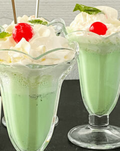 Check out this Shamrock Shake recipe for three delicious green milkshakes topped with whipped cream and a cherry.
