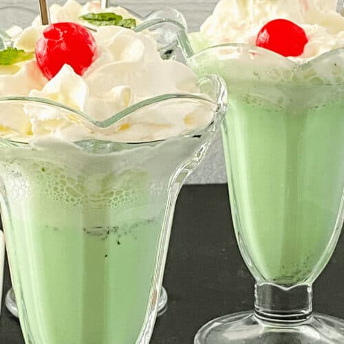 Check out this Shamrock Shake recipe for three delicious green milkshakes topped with whipped cream and a cherry.