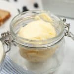 Side view of homemade butter in a jar
