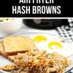 Plate of crispy Air Fryer Hash Browns served with two fried eggs and two slices of toast, accompanied by a bowl of salad and a checkered napkin in the background.