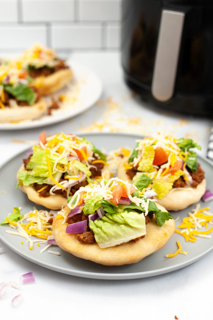 3 Indian Tacos on a gray dish.
