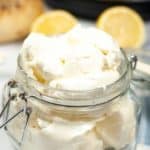 Instant Pot Cream Cheese in a Mason Jar with slices of lemon.