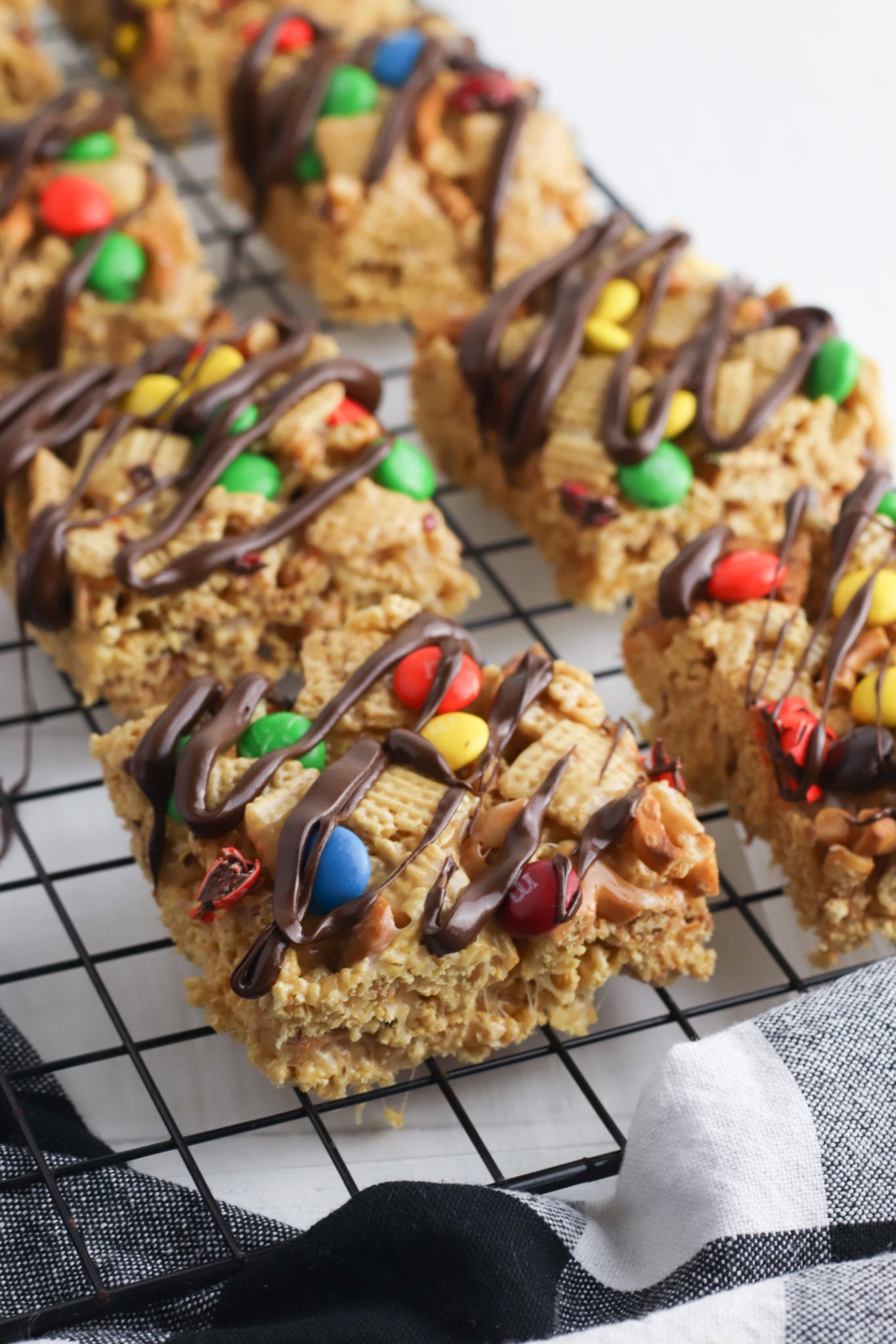Rack with cut squares of Peanut Butter Chex bars.