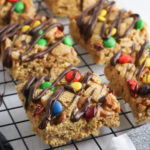 Rack with cut squares of Peanut Butter Chex bars.