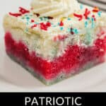 A slice of layered red, white, and blue poke cake with whipped cream and sprinkles on top, labeled "4th of July Poke Cake.