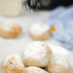 A dessert treat dusted with powdered sugar.