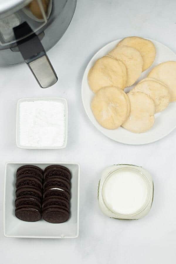 Cookies, dough and sugar for the treat.