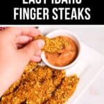 A hand holds a crispy finger steak above a small bowl of dipping sauce on a plate full of these delicious Idaho favorites, under the caption "Ultra Crispy Easy Finger Steaks.