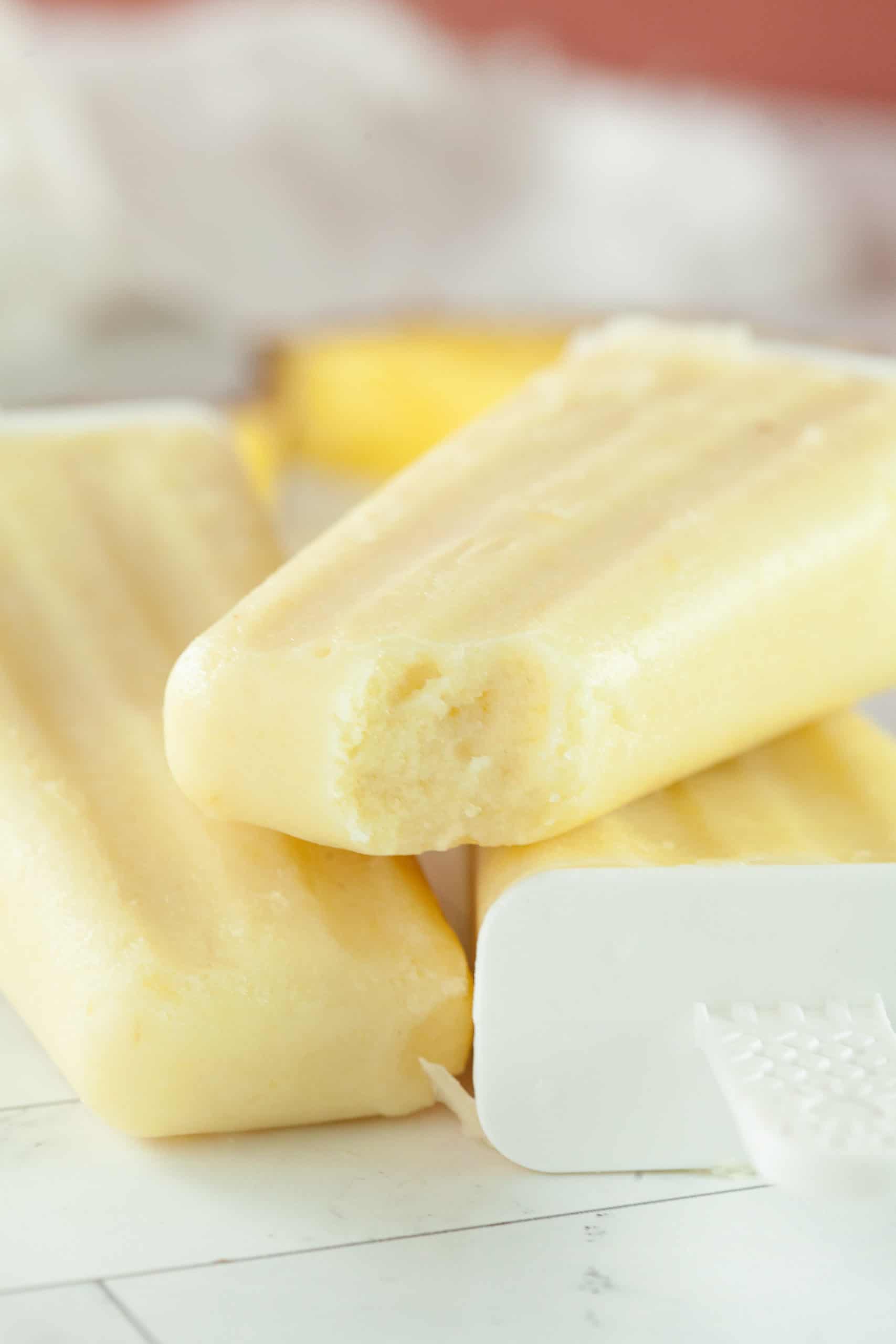 Stack of Pina colada popsicles.