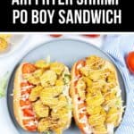 Plate with two shrimp po' boy sandwiches, perfectly crispy from the air fryer, topped with zesty sauce, crisp lettuce, and juicy tomato slices. Text above reads: "Crispy Air Fryer Shrimp Po Boy Sandwich.