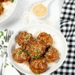 top shot of asian meatballs in a white bowl