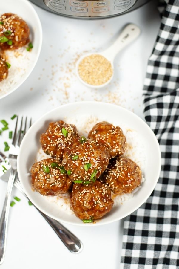 top shot of asian meatballs in a white bowl